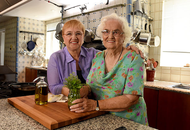 Photo of two women cooking together